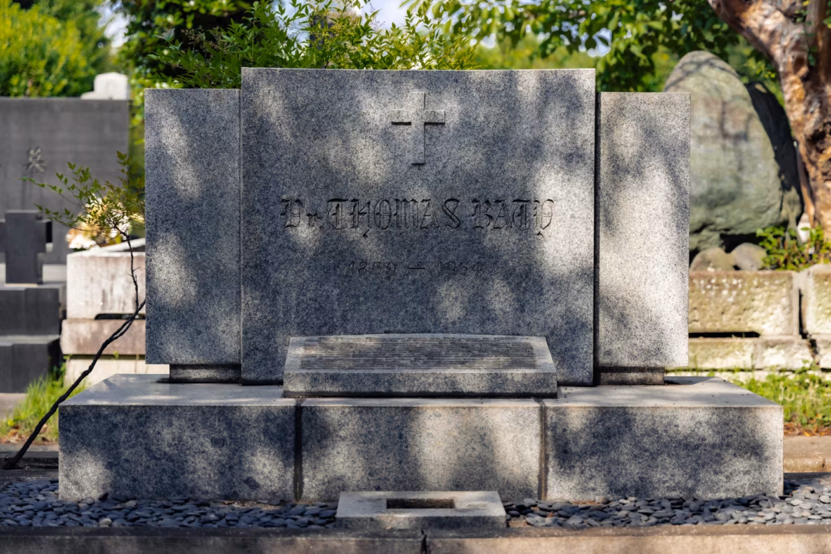 The large, worn tombstone of Thomas Baty.