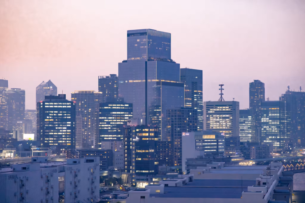 A group of skyscrapers in the early evening.
