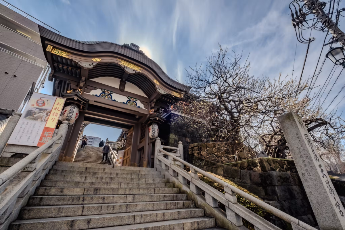 Steep stairs lead to the Shinto Shrine entrance.