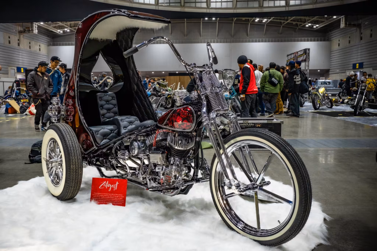 A Zeitgeist Hot Rod Trike at a car show.
