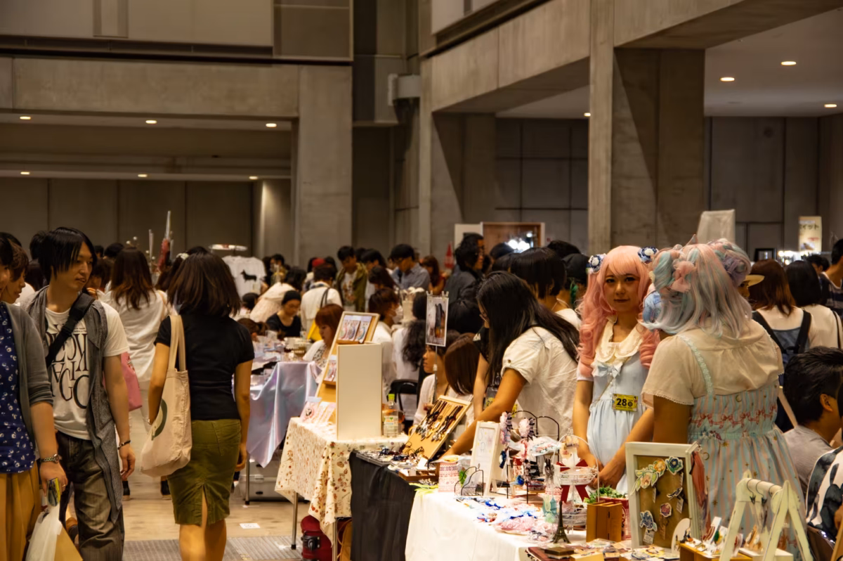 A crowded indoor art market.