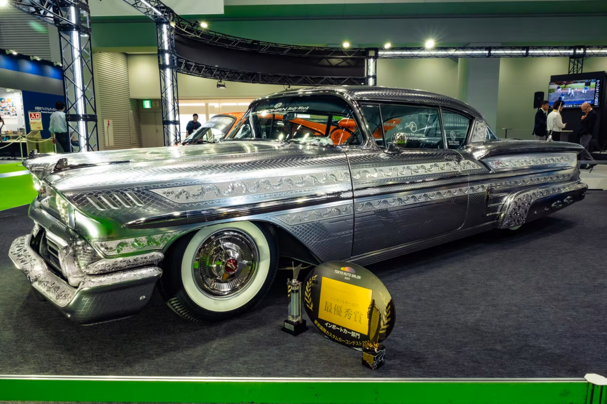 A silver custom Chevrolet Impala 1958 at Tokyo Motor Show 2019.