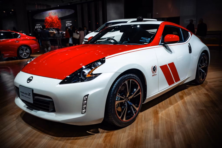 A Nissan Fairlady Z indoors under a spotlight.