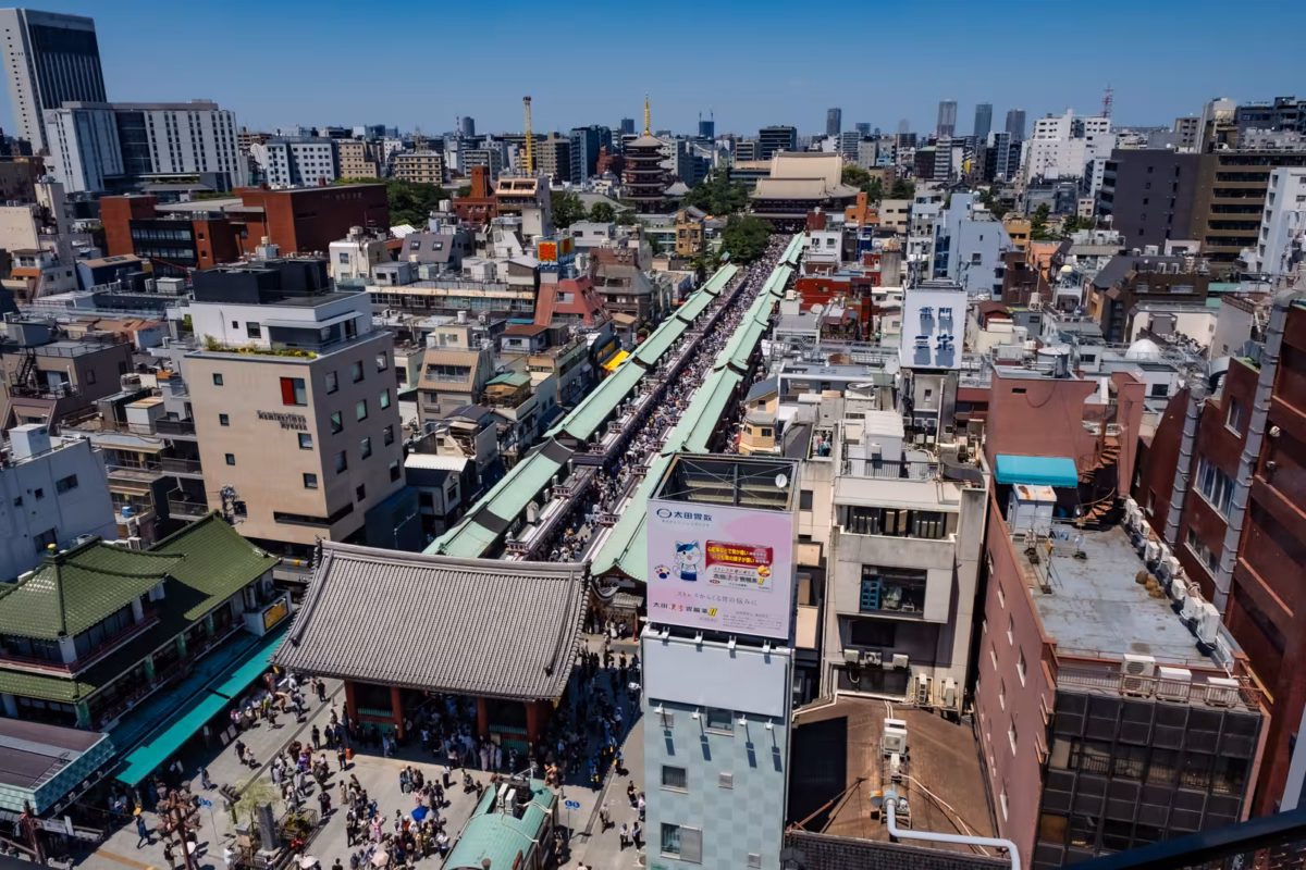 Aerial view of the crowded Nakamise-dori shopping street leading to Senso-ji Temple in Asakusa, Tokyo.