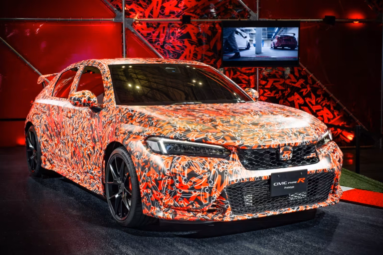 Honda Civic Type R Prototype with red and black camouflage wrap on display at Tokyo Auto Salon 2022.