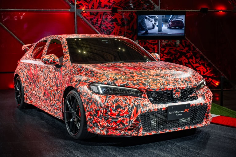 Red and black camouflaged Honda Civic Type R Prototype on display at Tokyo Auto Salon 2022.