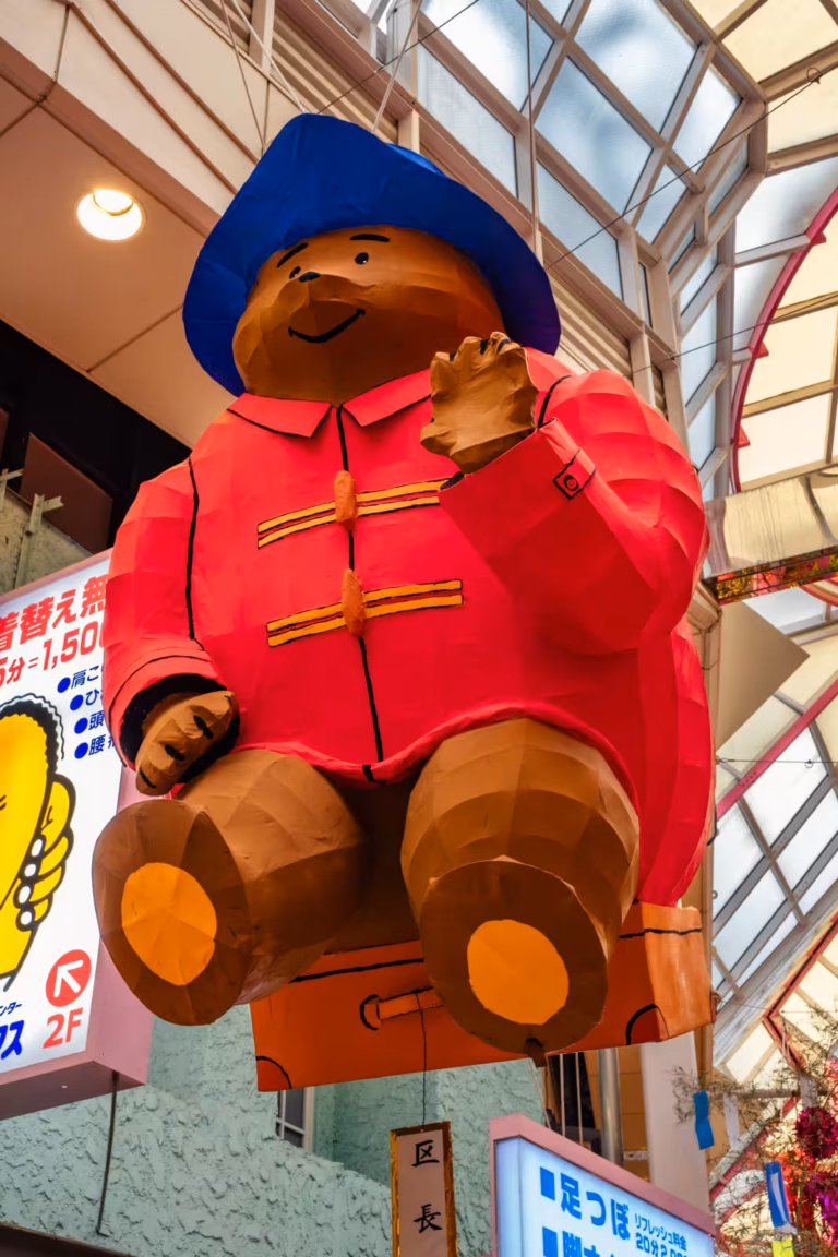 Large papier-mâché Paddington Bear figure hanging from the ceiling at the Asagaya Tanabata Festival.