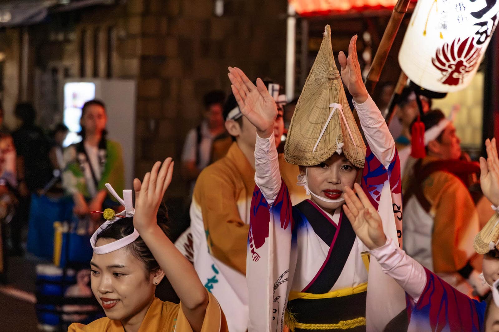 Dancers in traditional attire and straw hats perform at the Hatsudai Awa Odori.