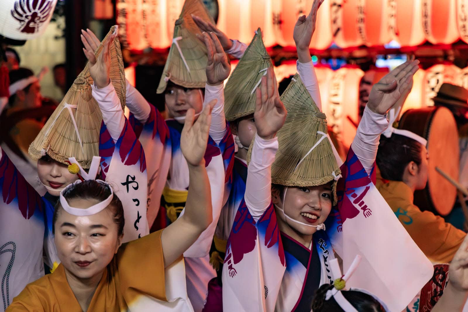 Dancers in straw hats and traditional attire perform at the Hatsudai Awa Odori.